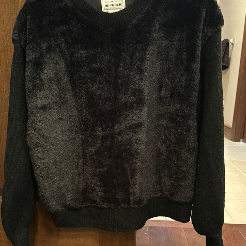 For the Republic black sweater. “ furry “ on front and back and sweater arms.